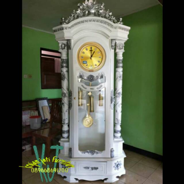 Lemari jam hias duco