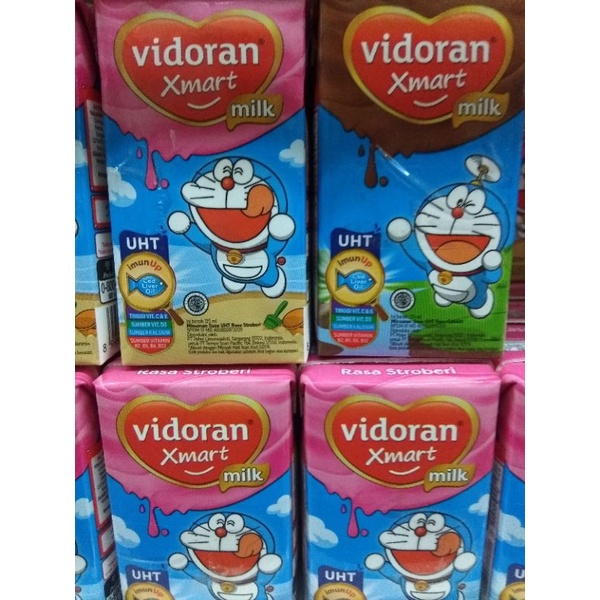 

Vidoran Xmart Milk UHT Rasa Strawberry dan Cokelat 115 Ml