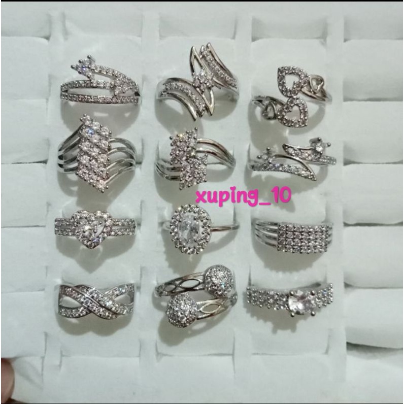 Grosir 1 Lusin Cincin wanita dewasa xp silver, model dan size campur.