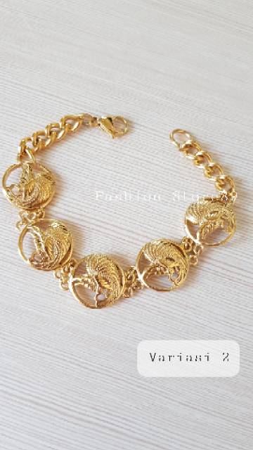 Gelang Tangan Cendrawasih / gelang import cendrawasih titanium gold antikarat import