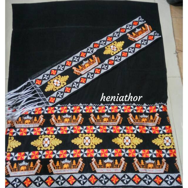 Kain tapis celugam bordir