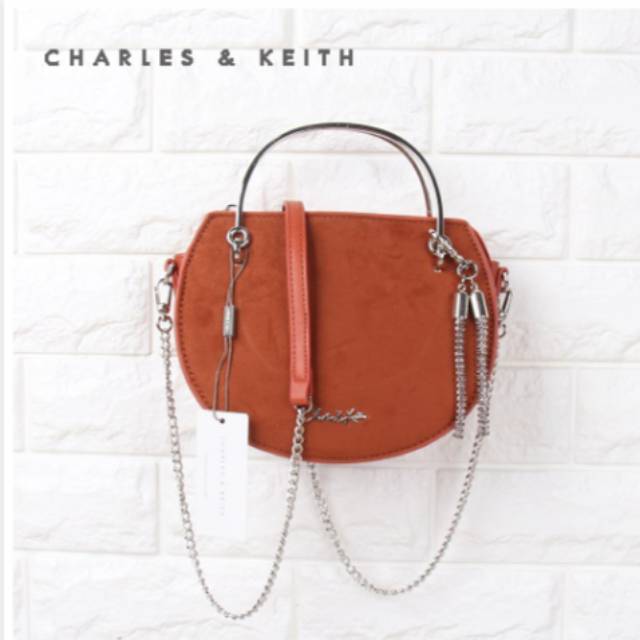 CK Tassel of metal saddle bag