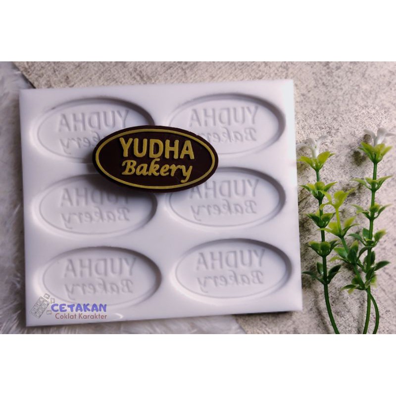 Cetakan coklat  Nama Brand OVAL