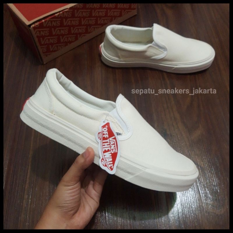 vans slip on cream white