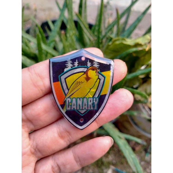 Emblem sangkar burung kenari