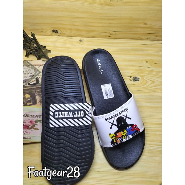 SANDAL SLIDE KAWS SUPREME SESAME / SANDAL SELOP KAWS GRADE ORI