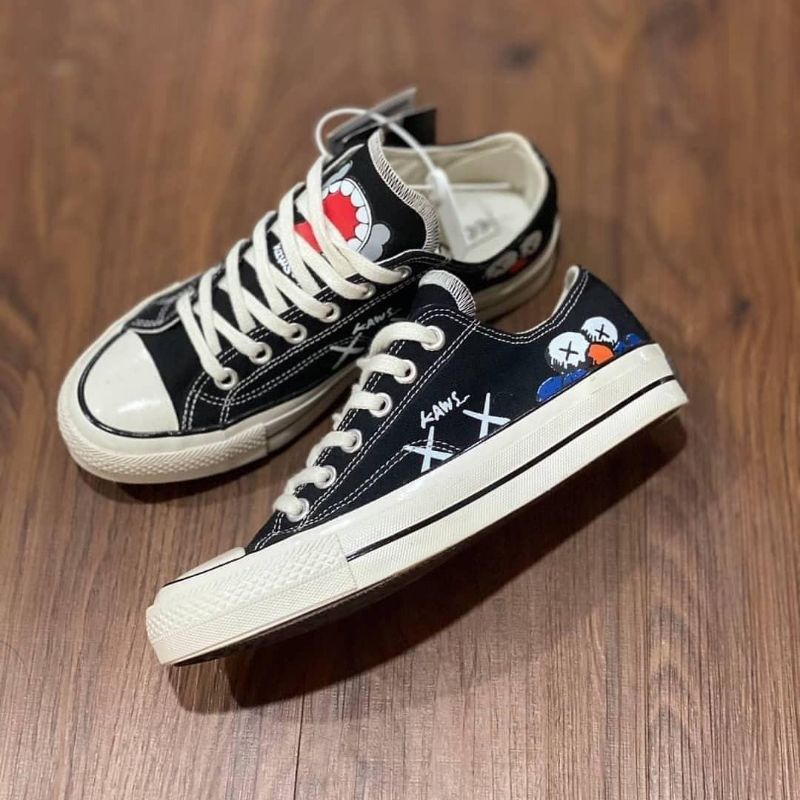 sepatu converse x kaws low premium import