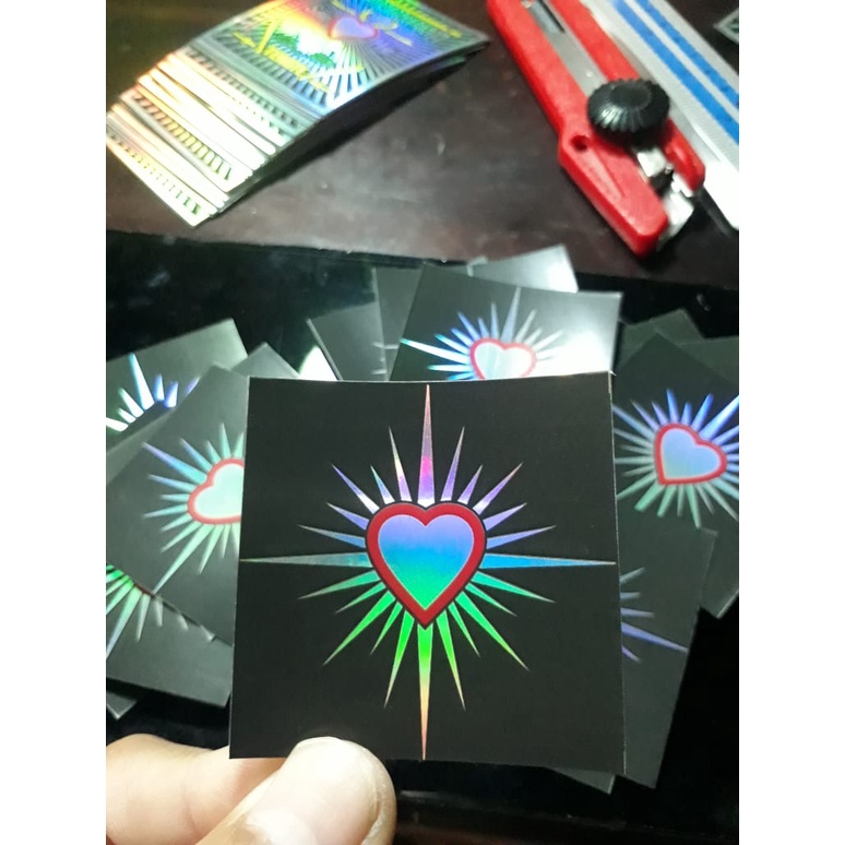 

stiker psht / setiker logo psht hati bersinar hologram printting
