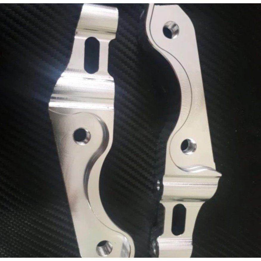 BREKET KALIFER MONOBLOCK/MONOBLOK NISIN/BREM 4 PISTON VIXION/JUPITER/NOUVO/VEGA/FIZ R/SCORPIO/BYSON