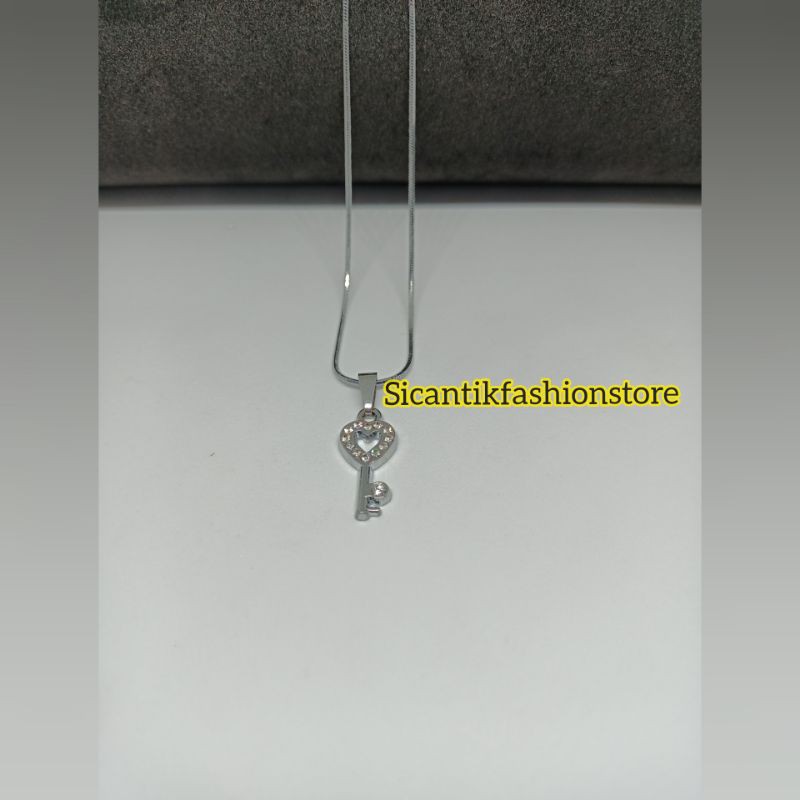 (PROMO)Kalung Titanium plus liontin Kunci Terlaris dan terbaru anti karat