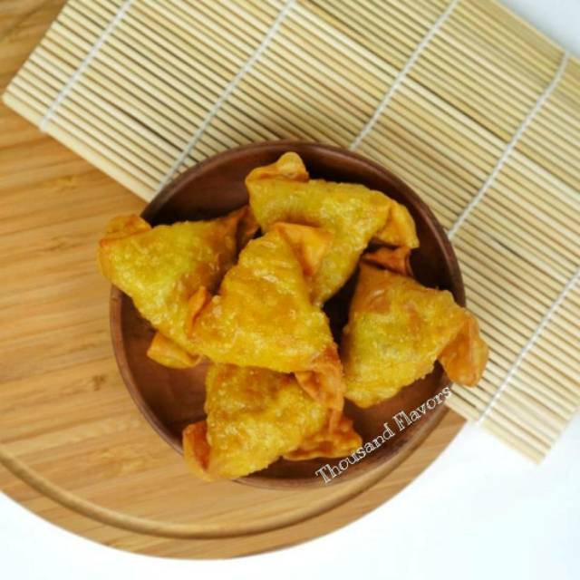 

Pangsit segitiga 10pcs FROZEN DIMSUM