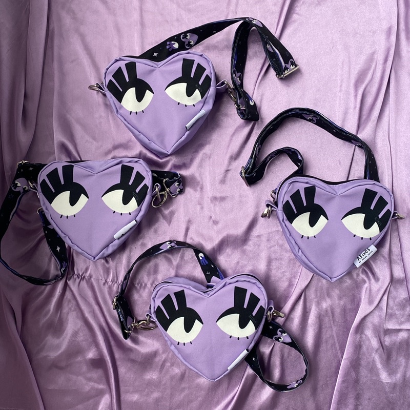 the purple heart sling bag by alixos