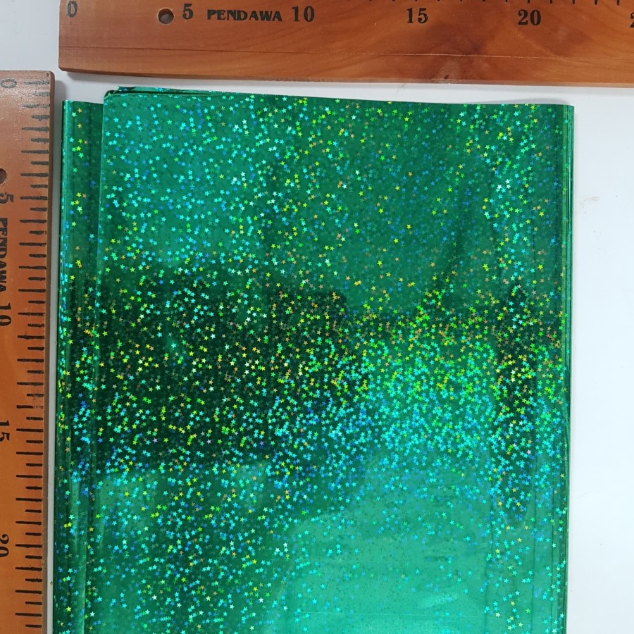 

Plastik Kado Hologram Hijau Bintang 50x65cm - 1 Ons Isi 14 Lembar