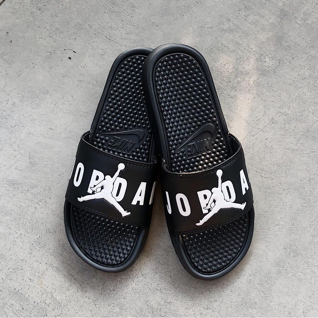 harga sandal nike benassi