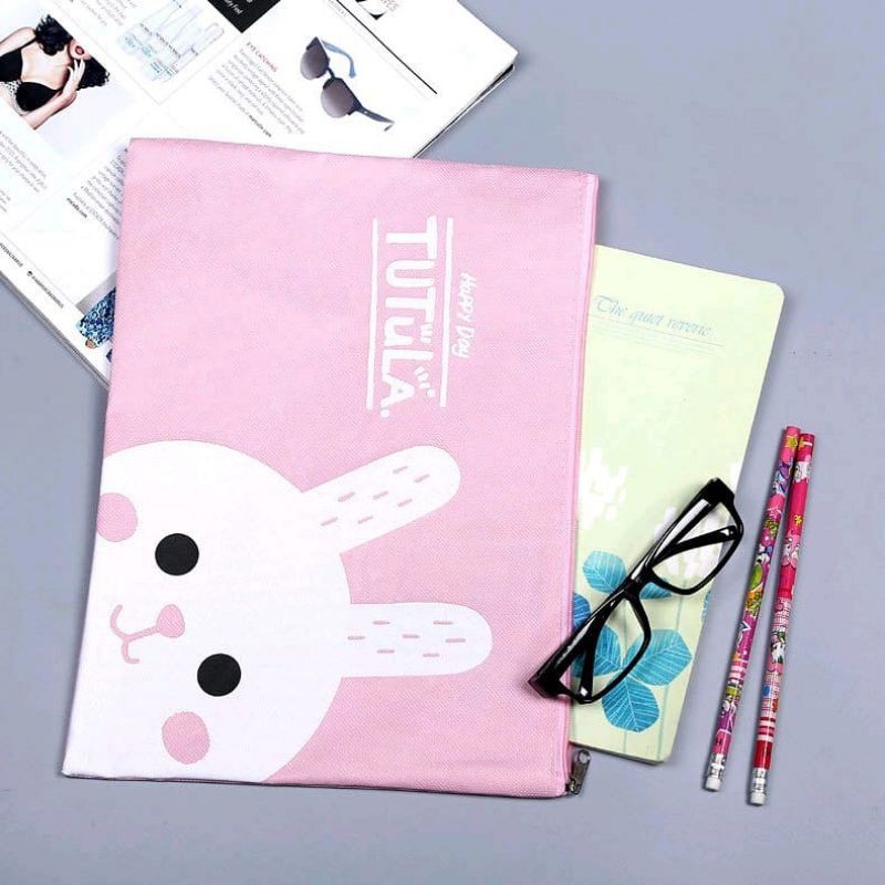 

Kantung File Motif Kartun