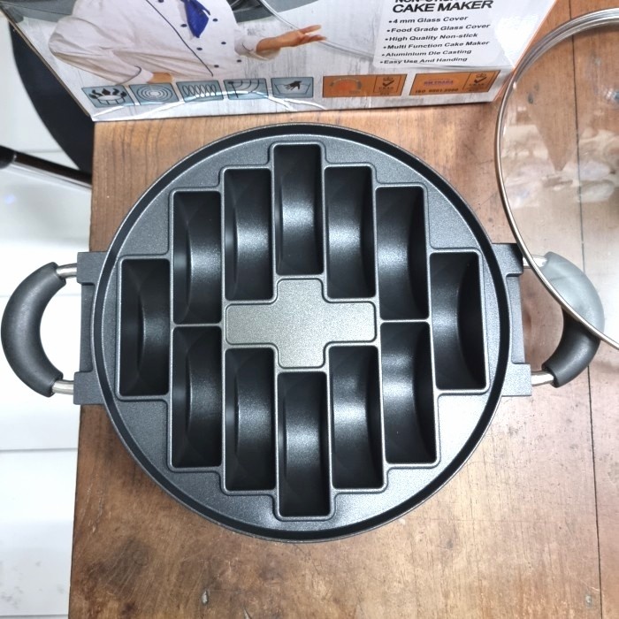 

Bakaranandia - Cetakan Kue Pukis Teflon 12 Lubang - Alat Kue Anti Lengket Shopee