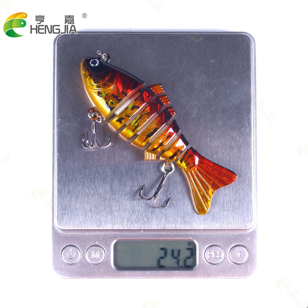 HENGJIA 1 PCS 10 cm 15.6g/23g Fishing Lure Hard Swimbait Casting Minnow Sea Bass Trout 7 Segment Lures Umpan Laser Bait