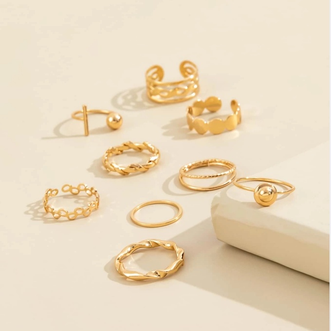 9pcs / Set Cincin Model Twist Hollow Warna Emas Gaya Vintage Untuk Wanita