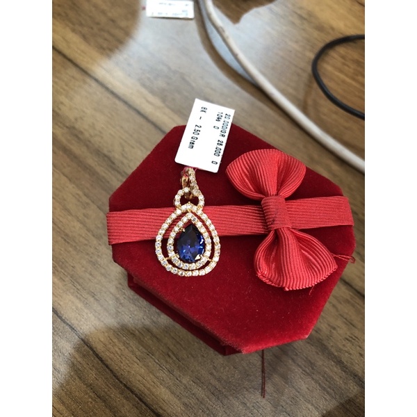 liontin batu biru oval