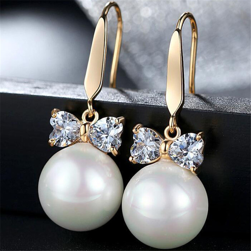 Korean Version of the Zircon Bow Pearl Earrings Female Lovely Ornament