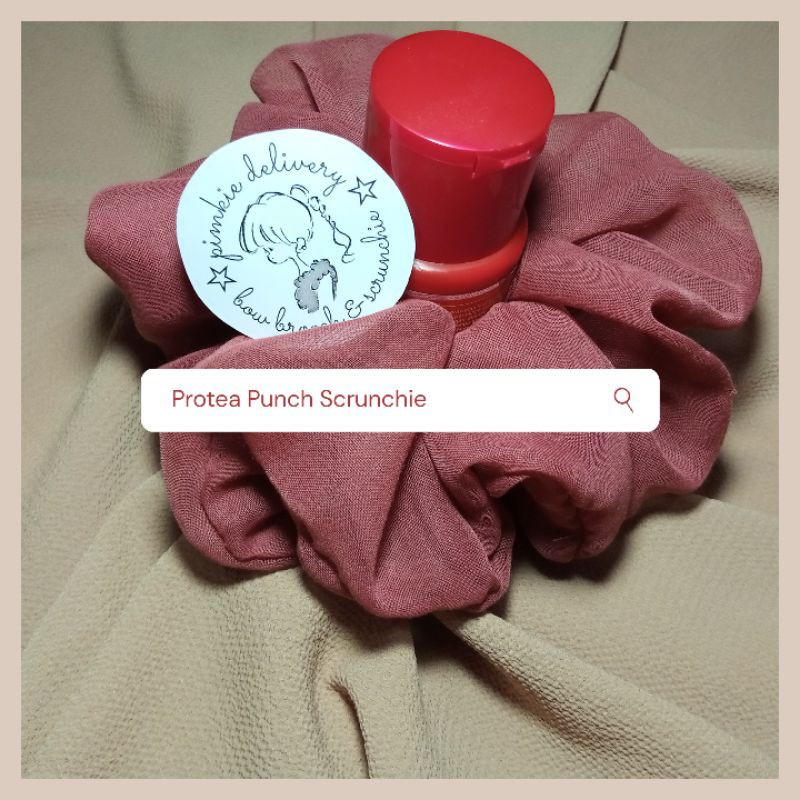 

Pimkie Delivery - Protea Punch Scrunchie