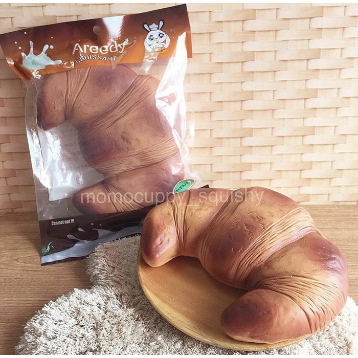 jumbo croisant squishy licensed by areedy (squishy roti slow and slow)