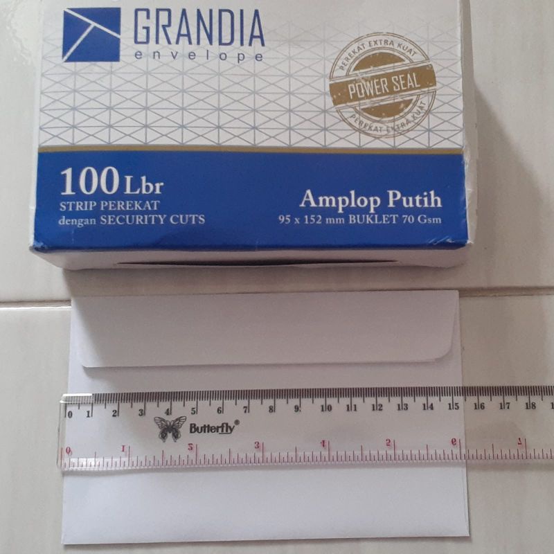 

Amplop putih strip perekat