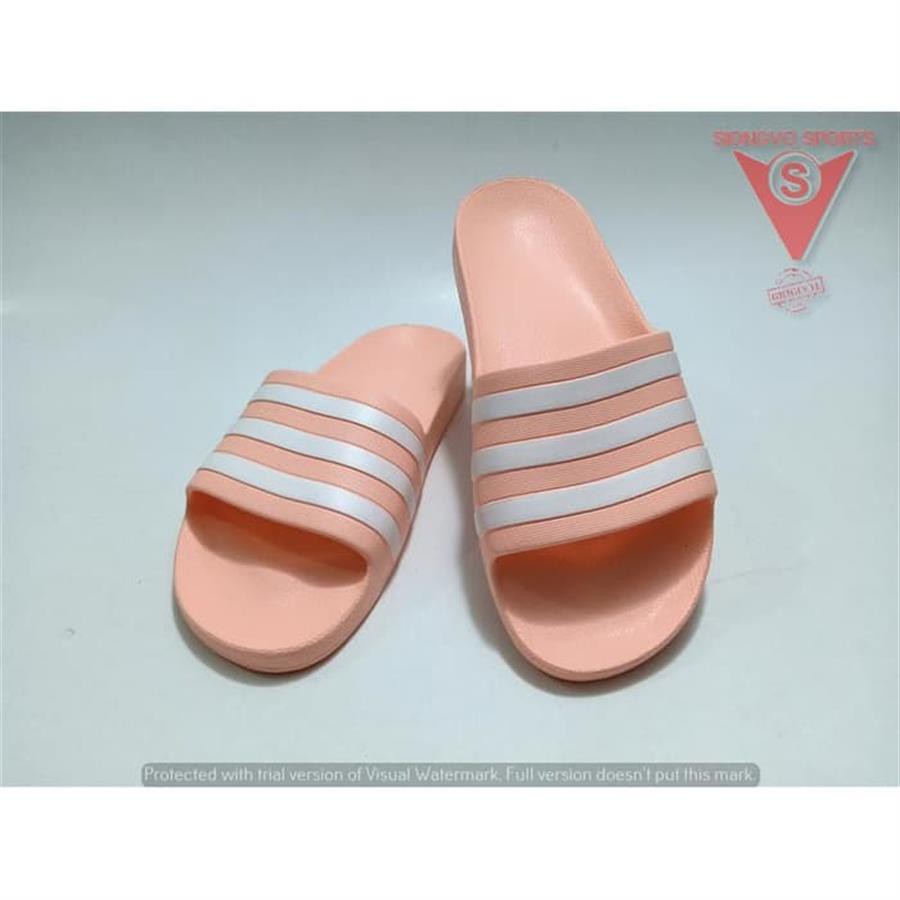pink and green adidas slides
