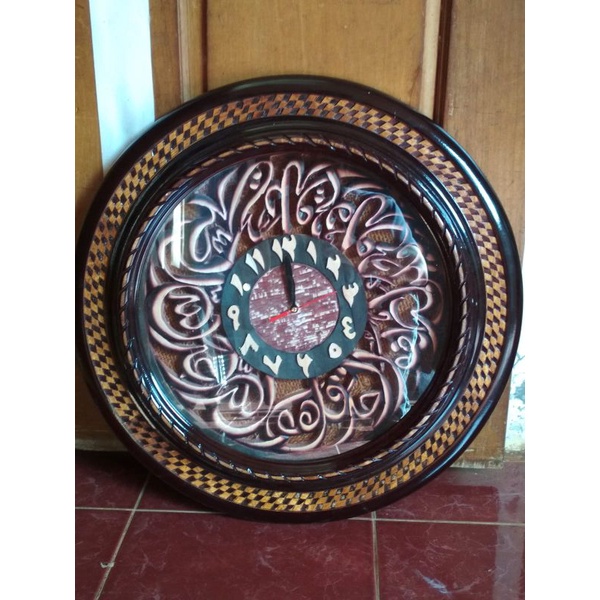 JAM DINDING UKIRAN KALIGRAFI JEPARA