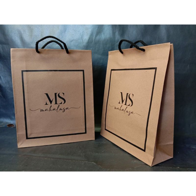 

PAPERBAG KRAFT COKLAT SIZE SEDANG, UK.pxlxt 22X7X27