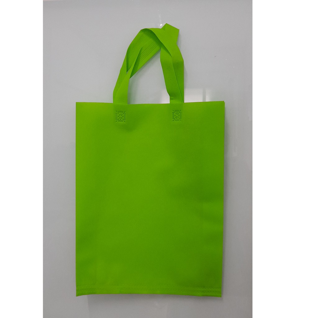 

Tas Press Spunbound Tali Goodie Bag Tas Belanja Warna Hijau Muda 25 cm x 35 cm