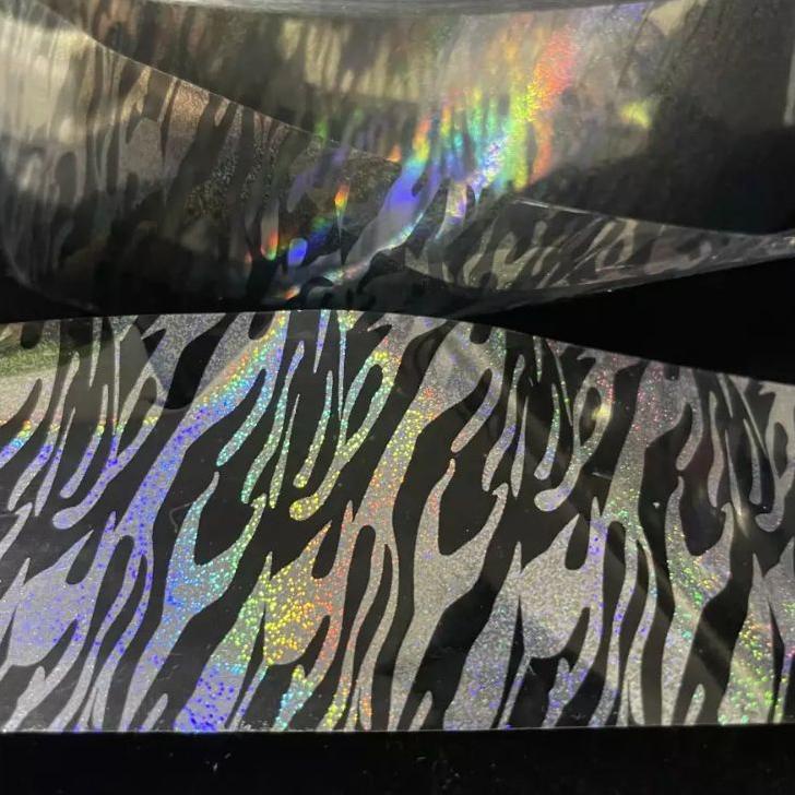 

☃ HOT STAMPING FOIL / HOLOGRAPHIC FOIL / HOLOGRAM FOIL MOTIF ZEBRA TRANSPARAN 4 Cm x 5 Meter (GROSIR