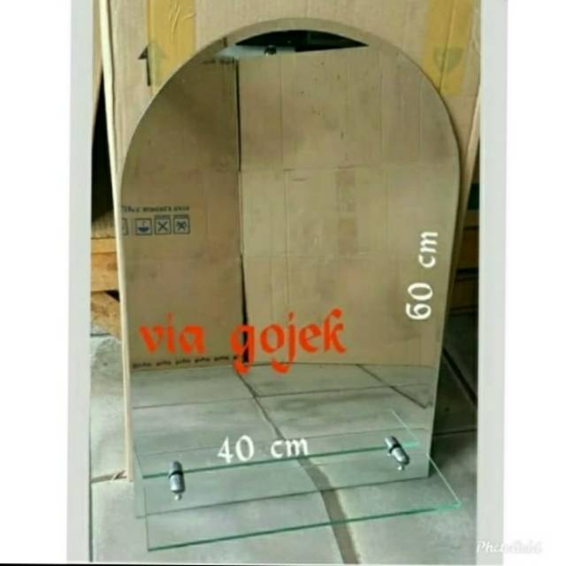 KACA CERMIN OVAL TATAKAN