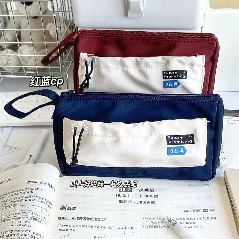 Sera Xiaohongshu dengan tas pensil gaya yang sama bernilai tinggi tas alat tulis multi-fungsi Korea sederhana yang tahan kotoran dan berkapasitas besar yang tahan kotoran