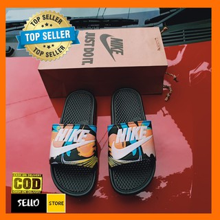 yellow nike flip flops