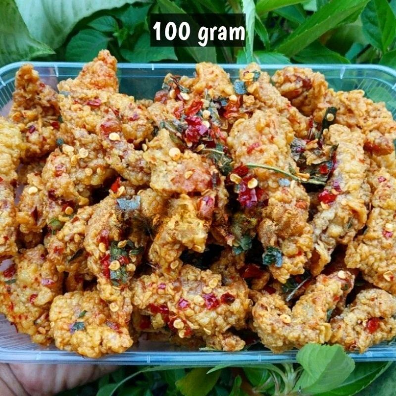 

Kulit ayam crispy pedas daun jeruk kemasan pouch 100 gram