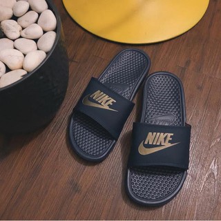 nike slippers gold