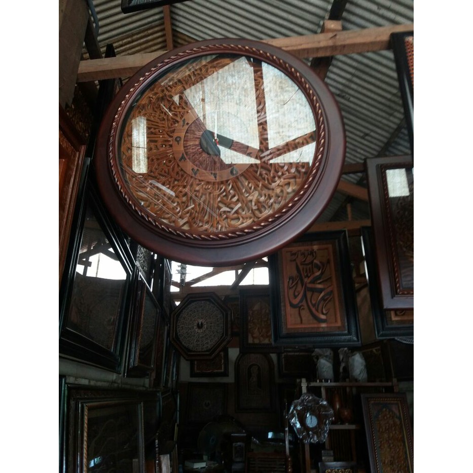 jam hias kaligrafi mebel jepara