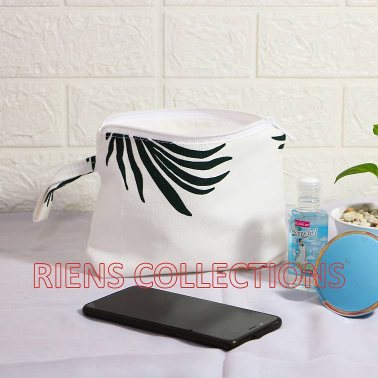 RIENS COLLECTIONS. DOMPET KANVAS POUCH KANVAS MOTIF DAUN KELAPA. TEMPAT PENSIL KANVAS