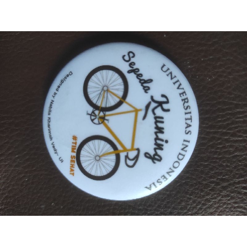UI STORE MERCH PIN SEPEDA KUNING