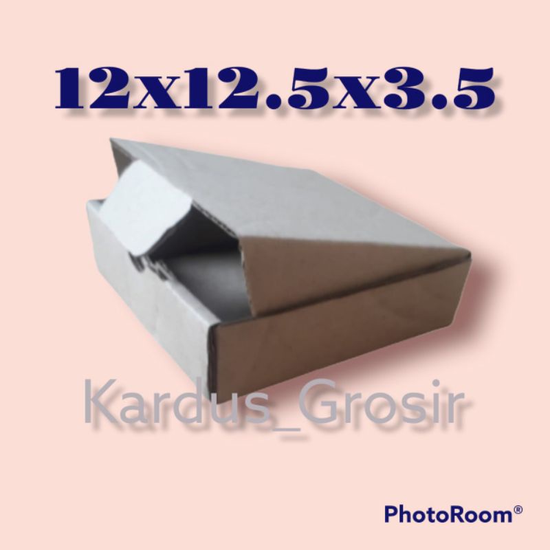 

Kardus packing die cut 12x12.5x3.5