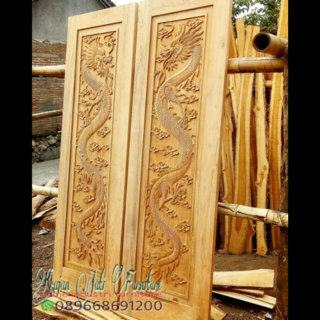 Pintu rumah jati ukiran naga tarung /pintu/pintu jati/pintu rumah