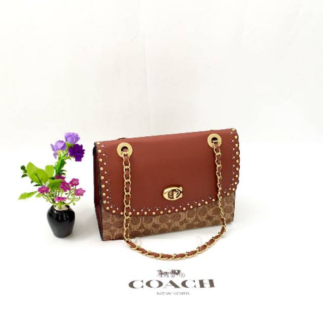 

Coach Parker Edge Scallop Rivets Leather Signature