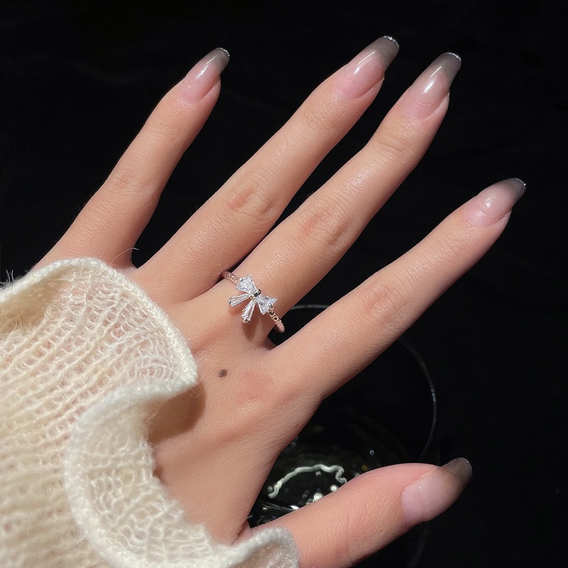 Cincin Model Terbuka Bahan 925 Silver Desain Pita Hias Kristalberlian Imitasi Adjustable Untuk Wanita