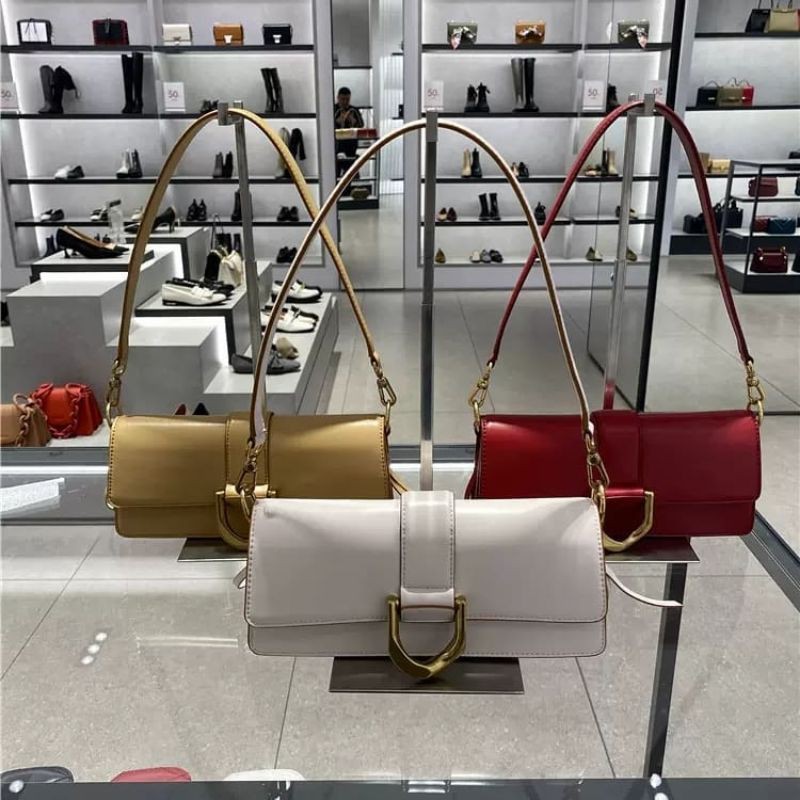 CK Metallic Buckle Shoulder Bag