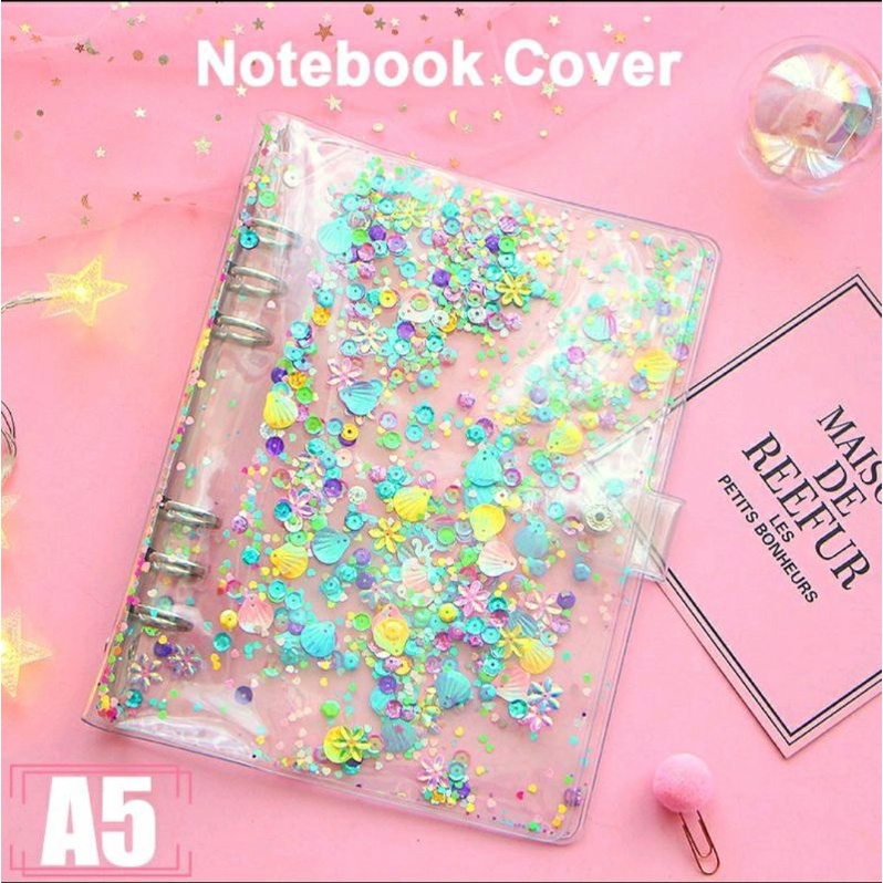 

binder A5 6 ring transparan manik2