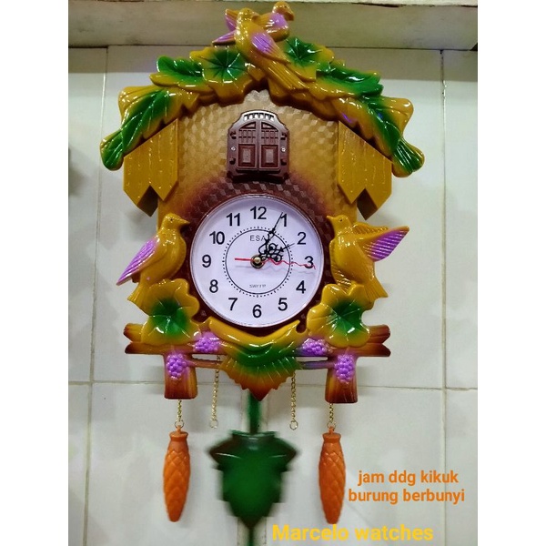 jam dinding berbunyi kikuk tiap jam dan burung keluar bersuara kikuk kikuk kikuk