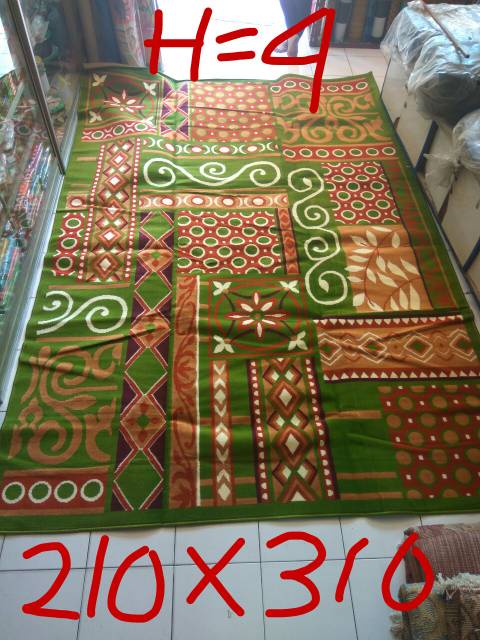 Karpet permadani motif abstrak