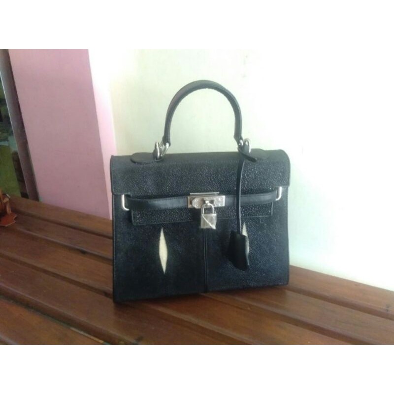 tas kulit pari totte mata