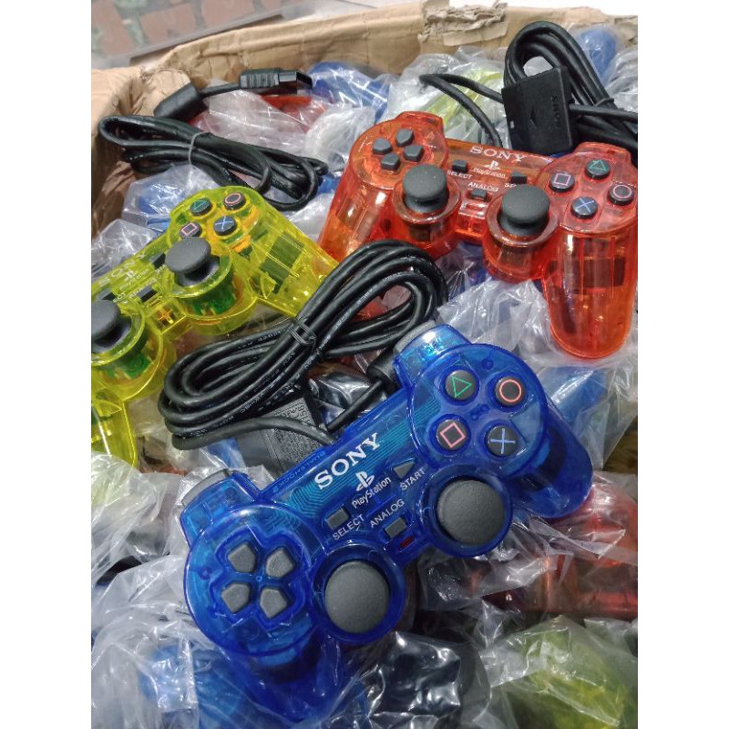 Stik ps2 op ori pabrik warna transparan kabel hitam serat